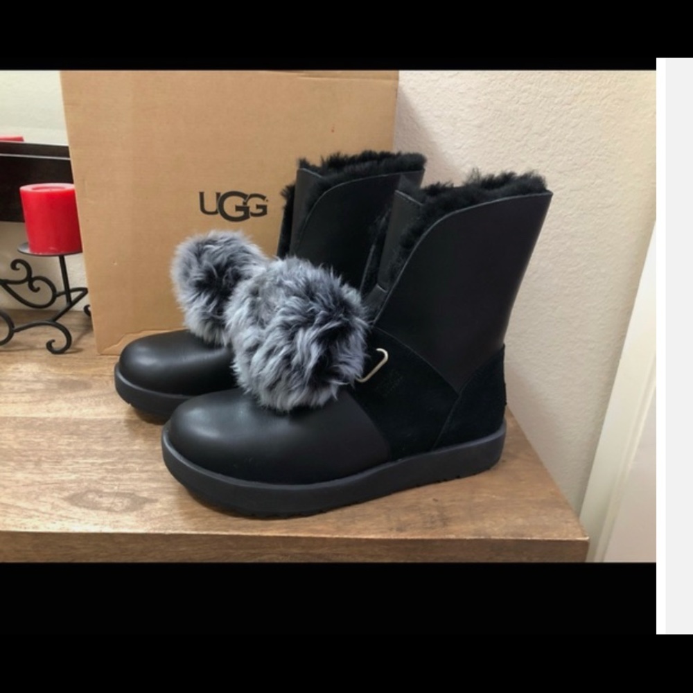 Ugg boots, leather with poms that can be removed.